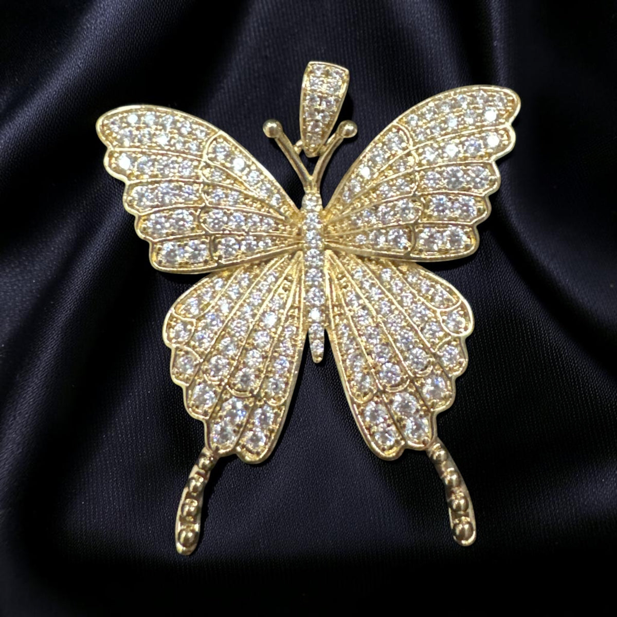 Dije mariposa